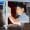 young-motivated-happy-cleaning-glass-display-window-colombian-corner-store